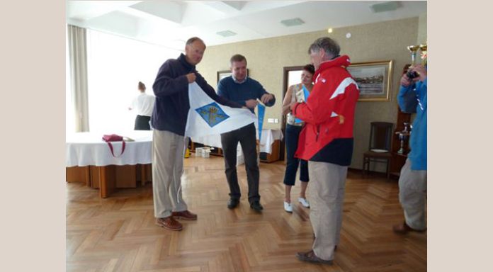 Exchanging burgees with the St. Petersburg River Yacht Club